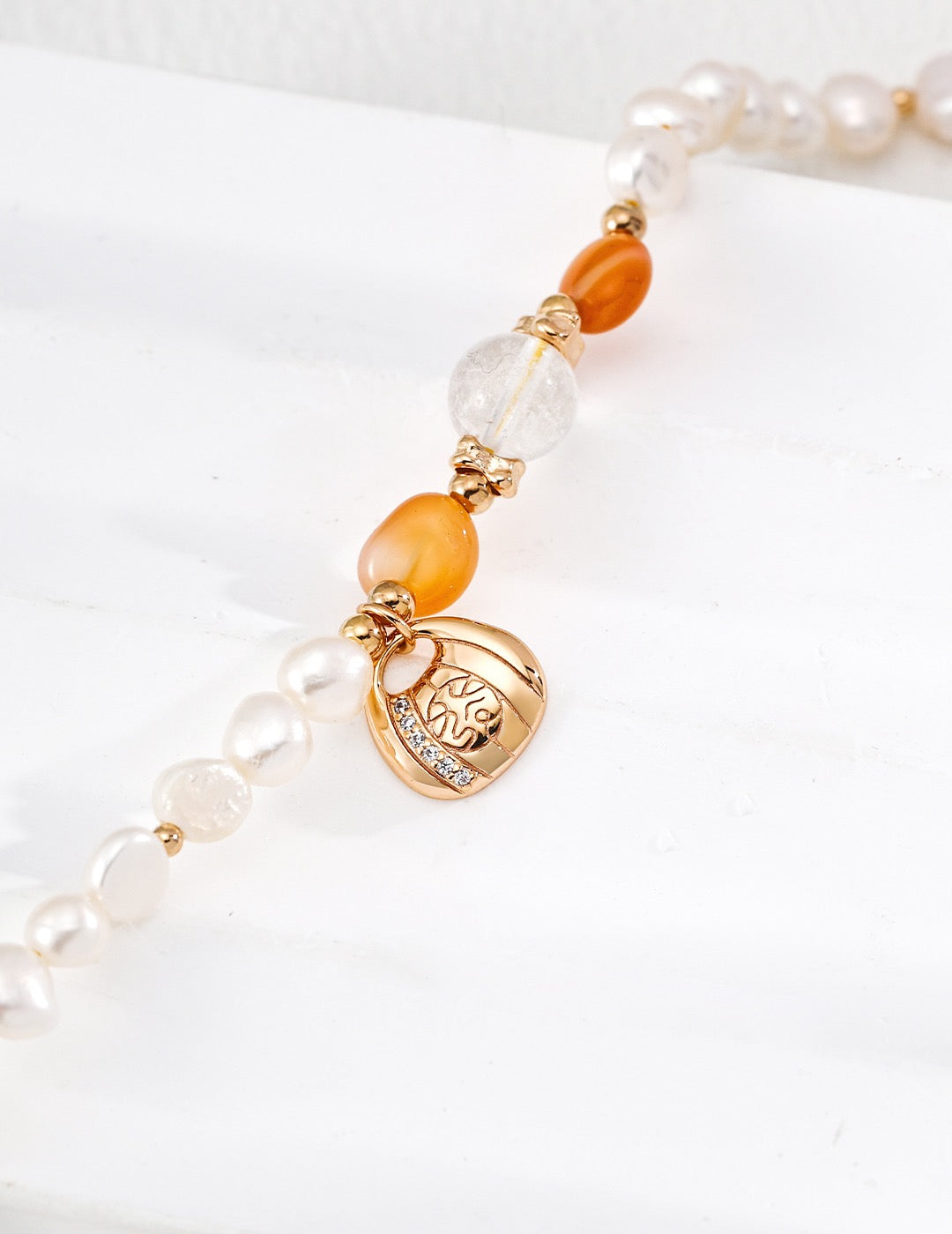 Armband aus 925er Silber mit Naturperle und rotem Achat